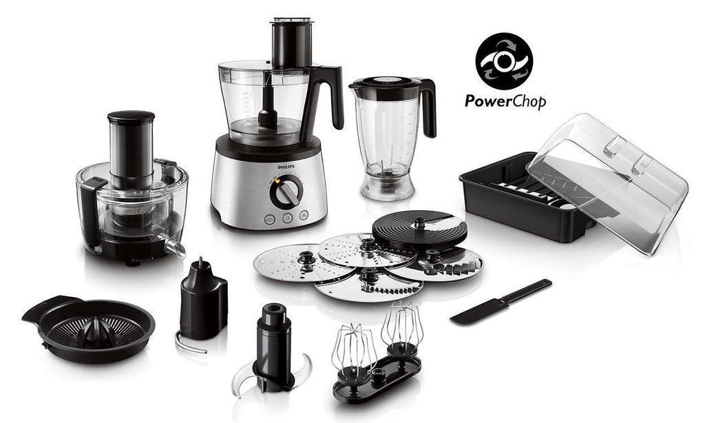 A collection of food processor attachments and accessories, including blades, beaters, a juicer attachment, and a blender jug, arranged around two food processor bases, with a logo and text 'PowerChop' at the top right.