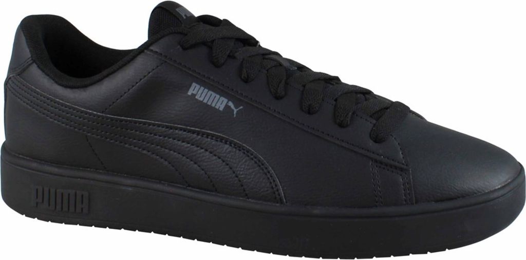 A black Puma sneaker is shown from the side against a white background.
