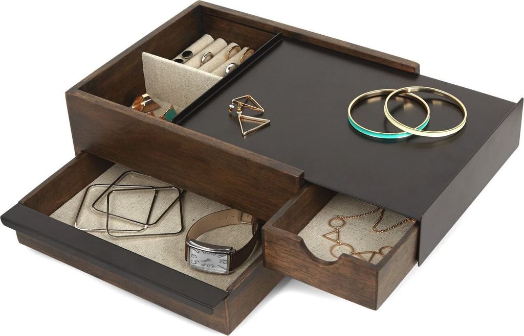 A jewelry box with multiple compartments and drawers, displaying various jewelry items.
