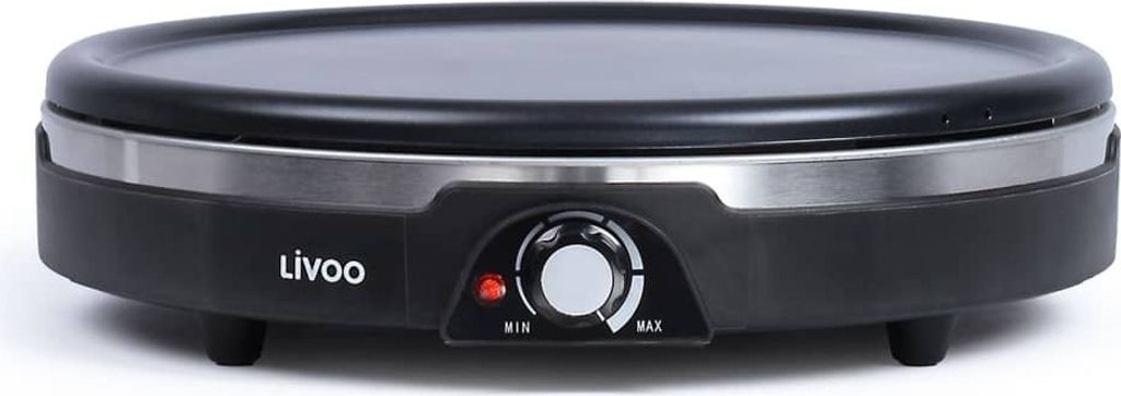 A front view of a black electric crepe maker on a white background.