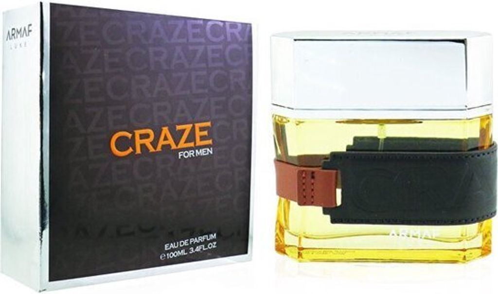 A perfume box and bottle are displayed side-by-side against a white background.