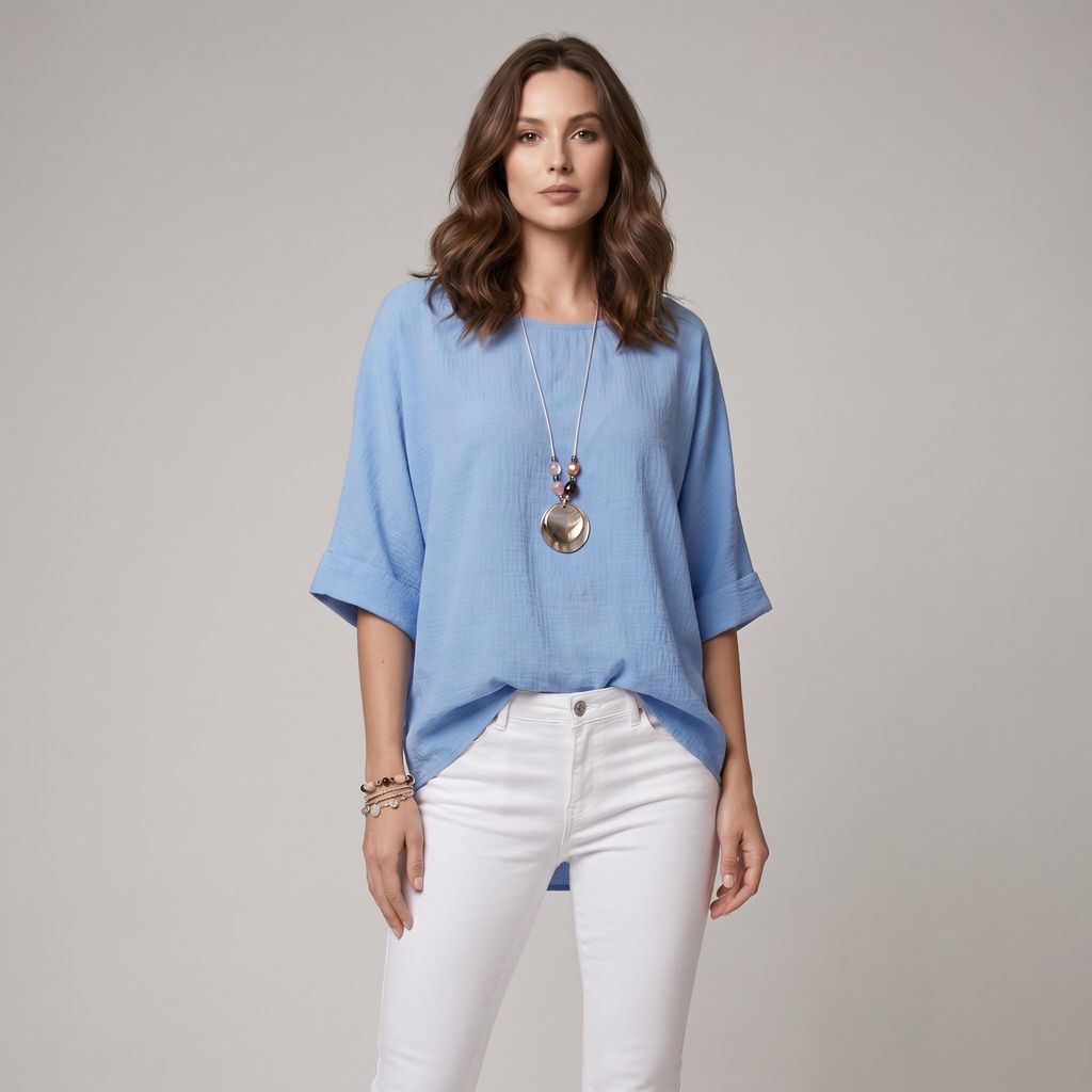 Damen Oversize-Bluse aus leichter Viskose mit High-Low-Saum und passender Kette. Luftig, bequem und vielseitig kombinierbar für Alltag und Büro S/M