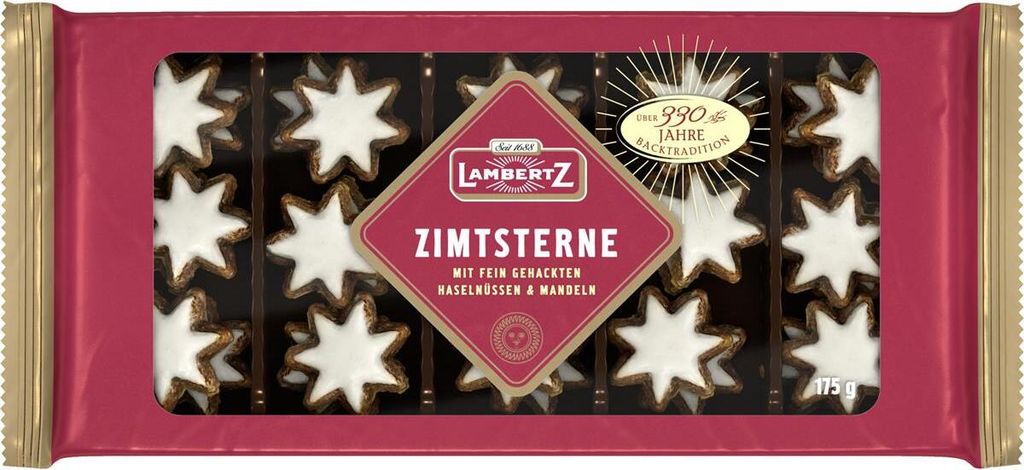 A package of Lambertz Zimtsterne cookies, shaped like stars and decorated with white icing.