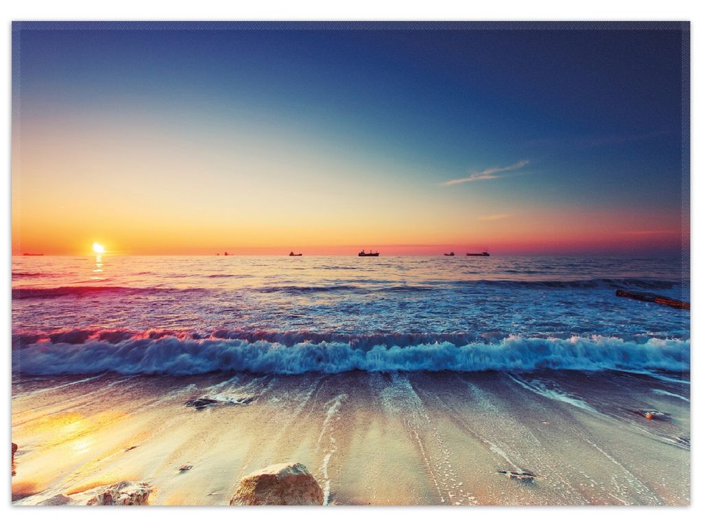 Wallario Premium Teppich, Größe 50 x 70 cm, Sonnenuntergang am Meer mit Wellen am Strand