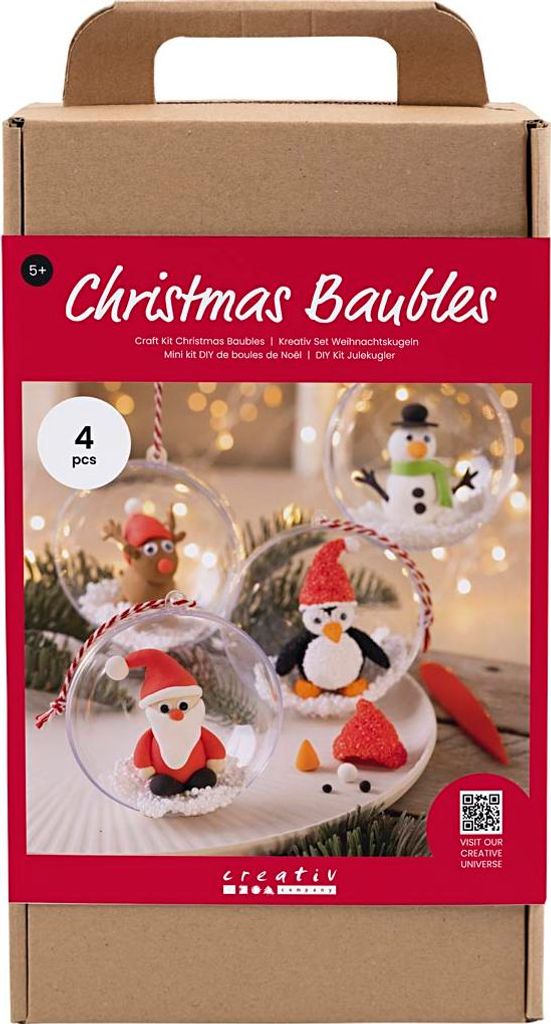 A cardboard box containing a craft kit for making Christmas baubles, with images of completed baubles on the front.
