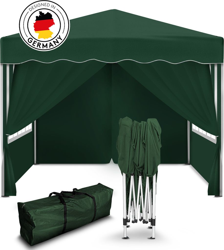 A green pop-up gazebo is shown, partially set up, with a folded frame and a carrying bag in the foreground. A circular logo indicating "Designed in Germany" is visible on the top left.