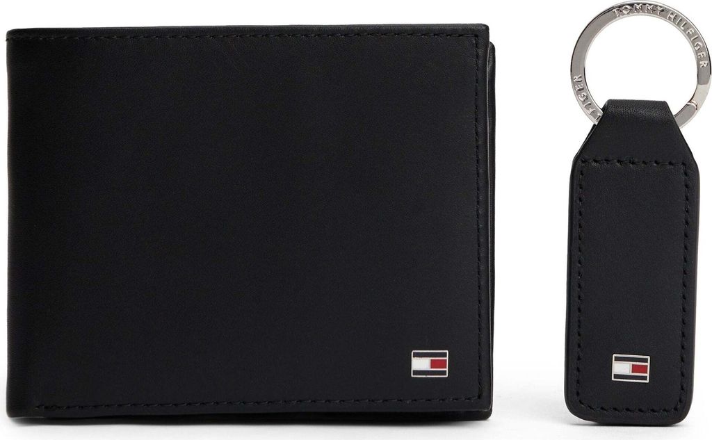 A black leather wallet and keychain set.
