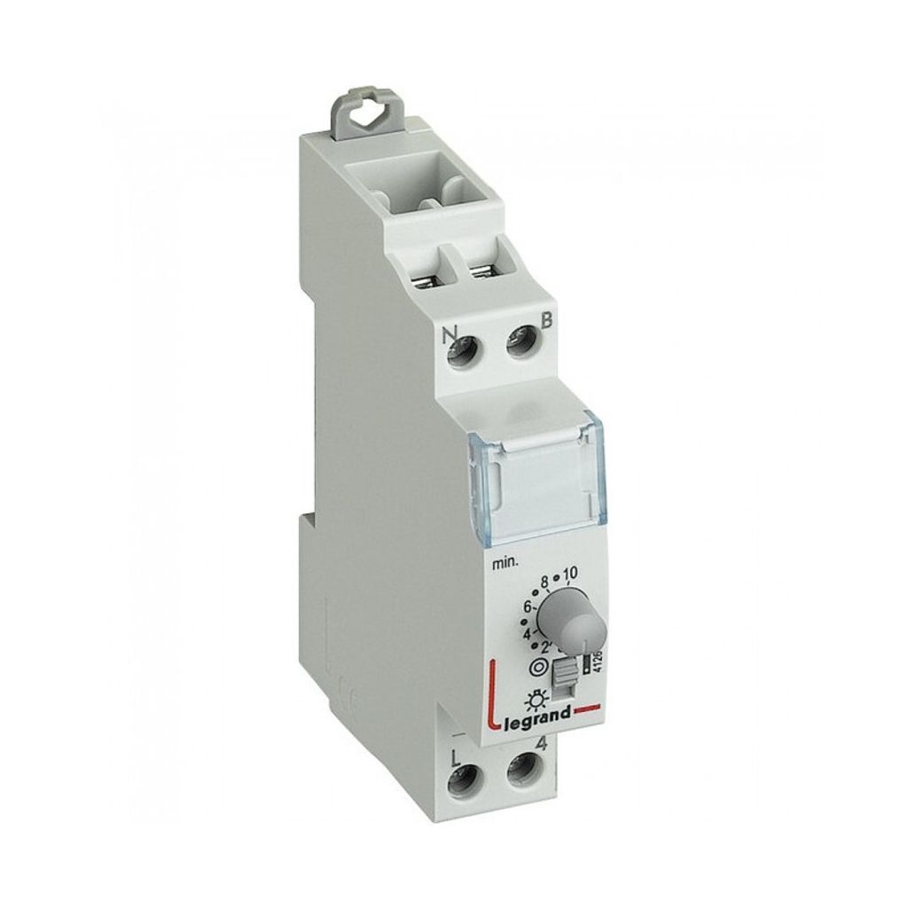 A white electrical timer device with a dial and terminals.