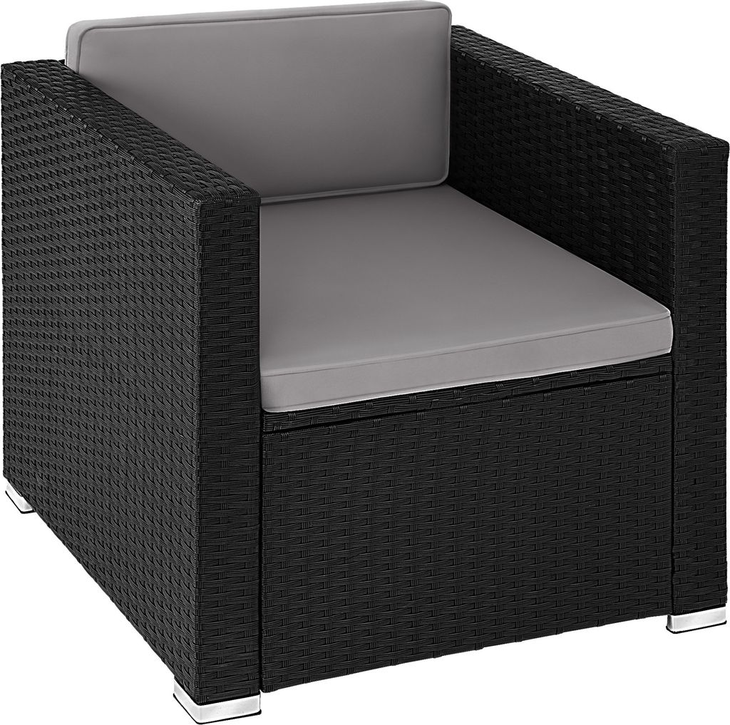 A black rattan armchair with gray cushions, shown from a front-side angle.
