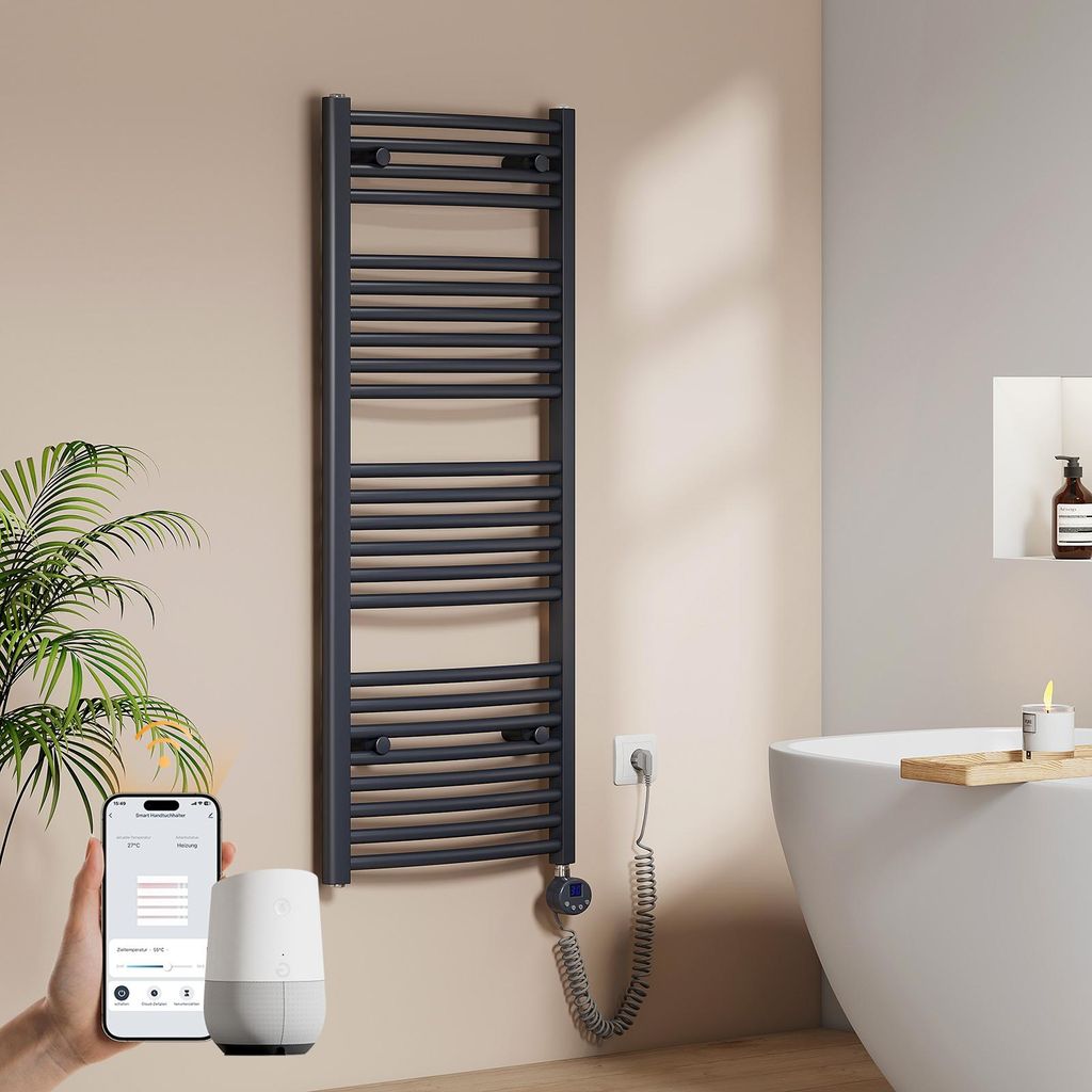 A bathroom scene with a towel warmer, a bathtub, and a plant.