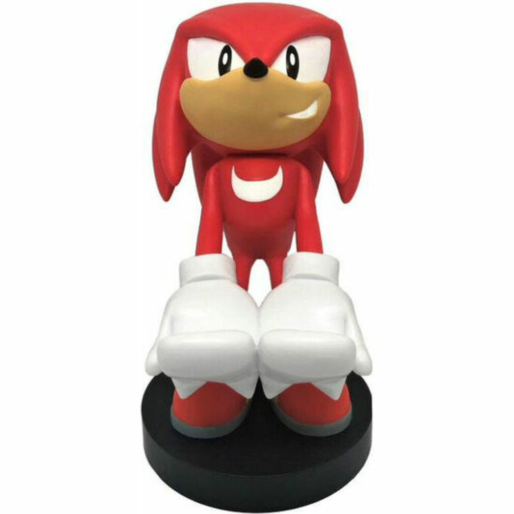 A figurine of the character Knuckles from Sonic the Hedgehog standing on a black base.
