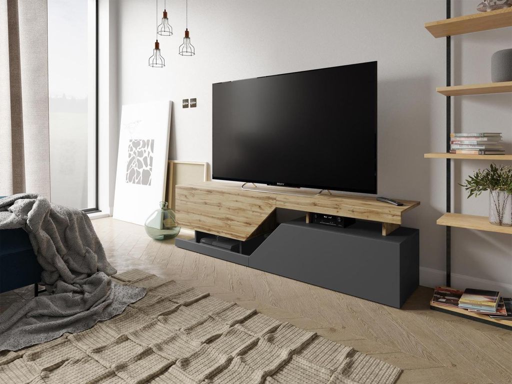A modern living room with a TV stand and a television.