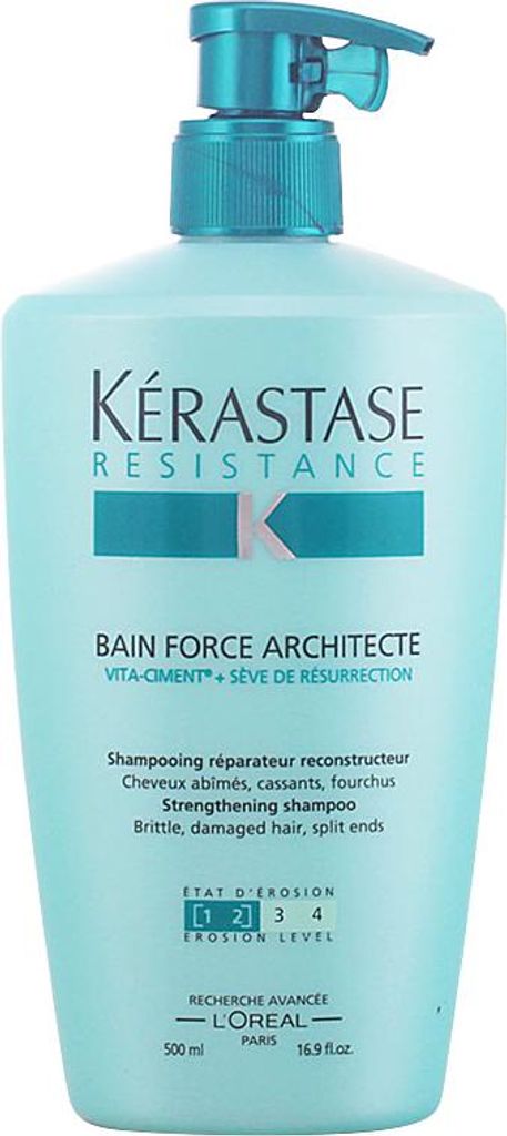A bottle of Kerastase shampoo with a pump dispenser.