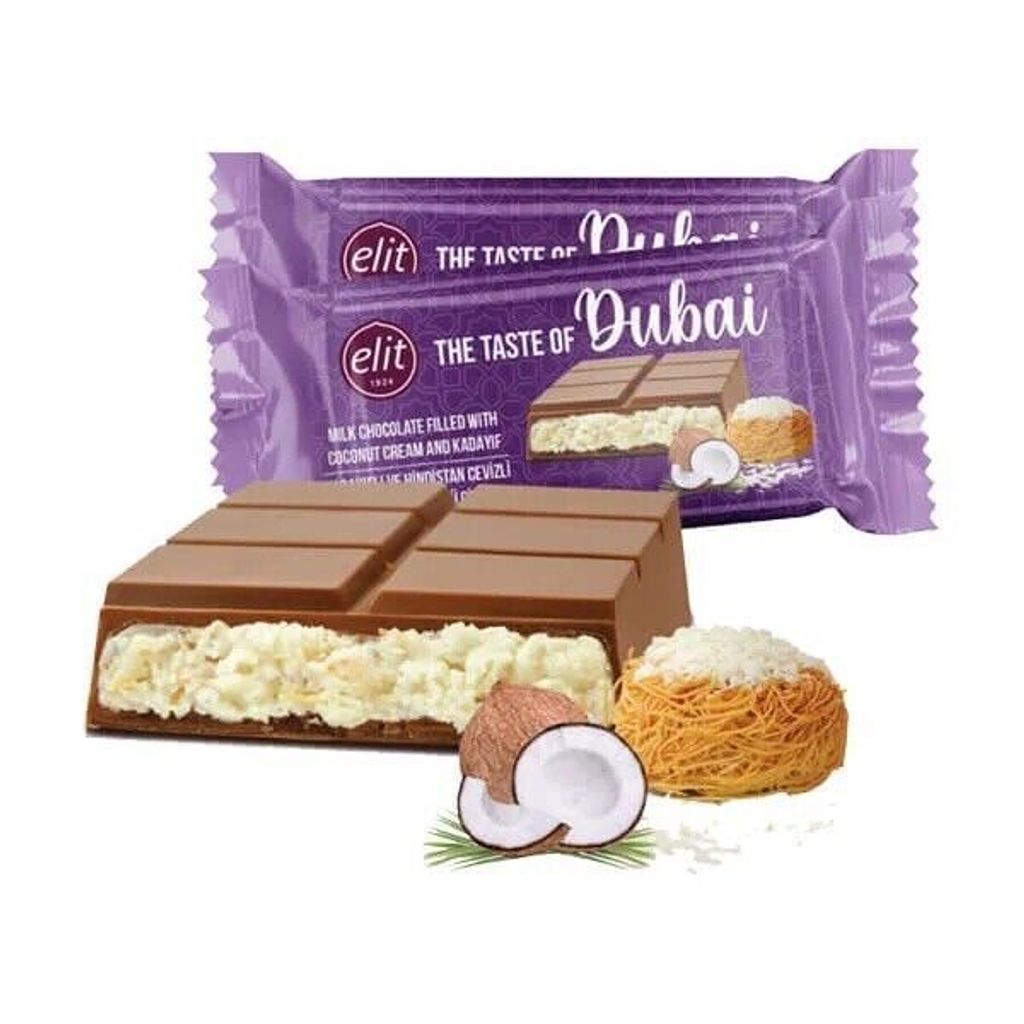 A chocolate bar with coconut cream and kadayif filling, along with its packaging, a halved coconut, and a small dessert.
