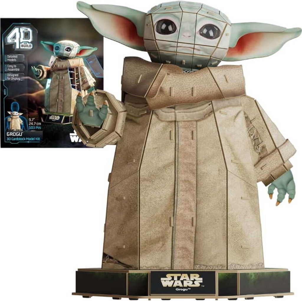 A 3D cardboard model of Grogu from Star Wars, with its packaging in the background.