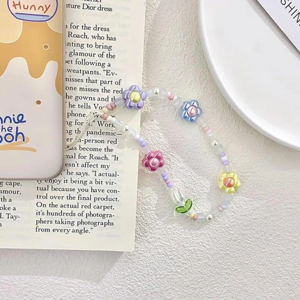 Bracelet de téléphone pour femmes avec fleurs et perles élégantes