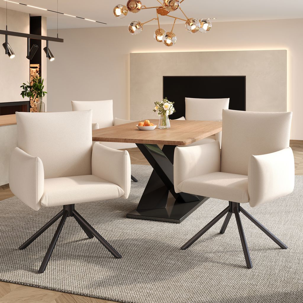 A dining room setting with a wooden table and chairs.
