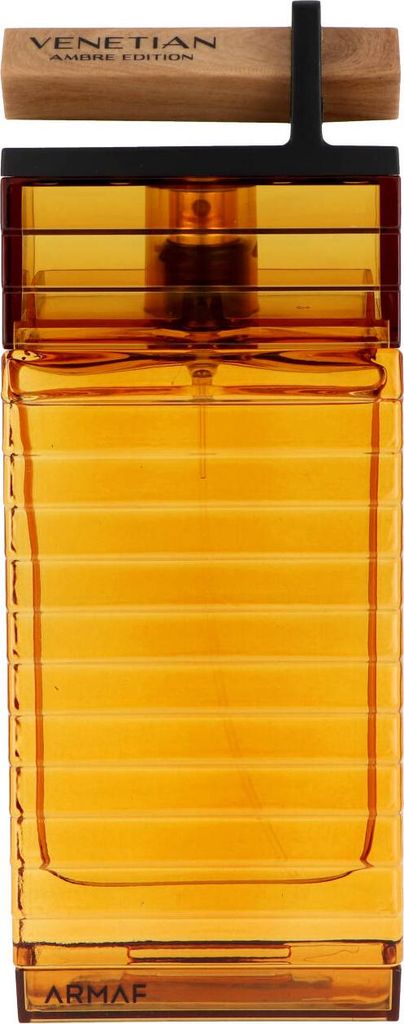 A close-up, front-facing studio shot of an amber-colored perfume bottle with a black cap and a wooden accent.