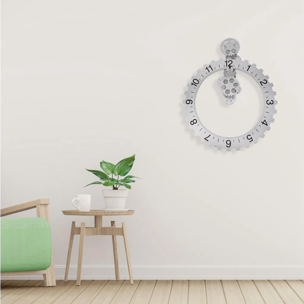 Pendule murale rotative avec roues dentées apparentes décor argent