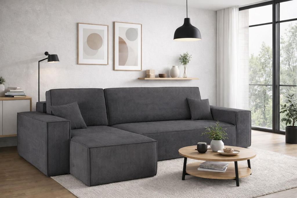 A modern living room with a dark gray sectional sofa.