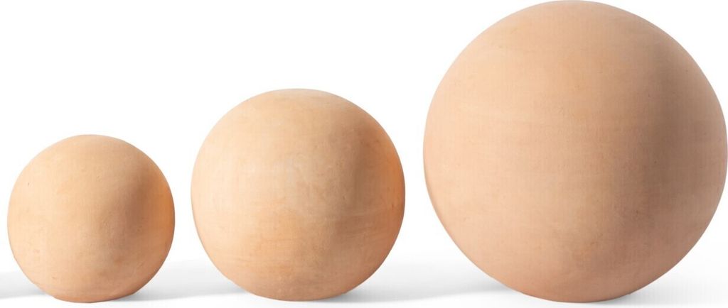 Three terracotta spheres of varying sizes are displayed against a white background.