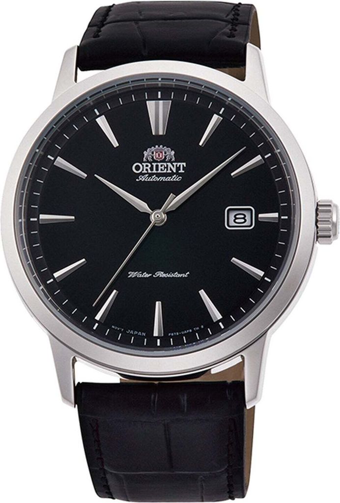 A close-up studio shot of an Orient Bambino automatic watch with a black dial and a black leather strap.