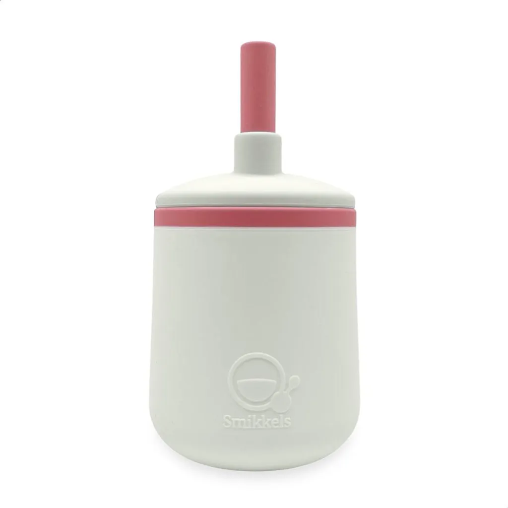 Petit verre en silicone pour premiers repas bébé Smikkels rose