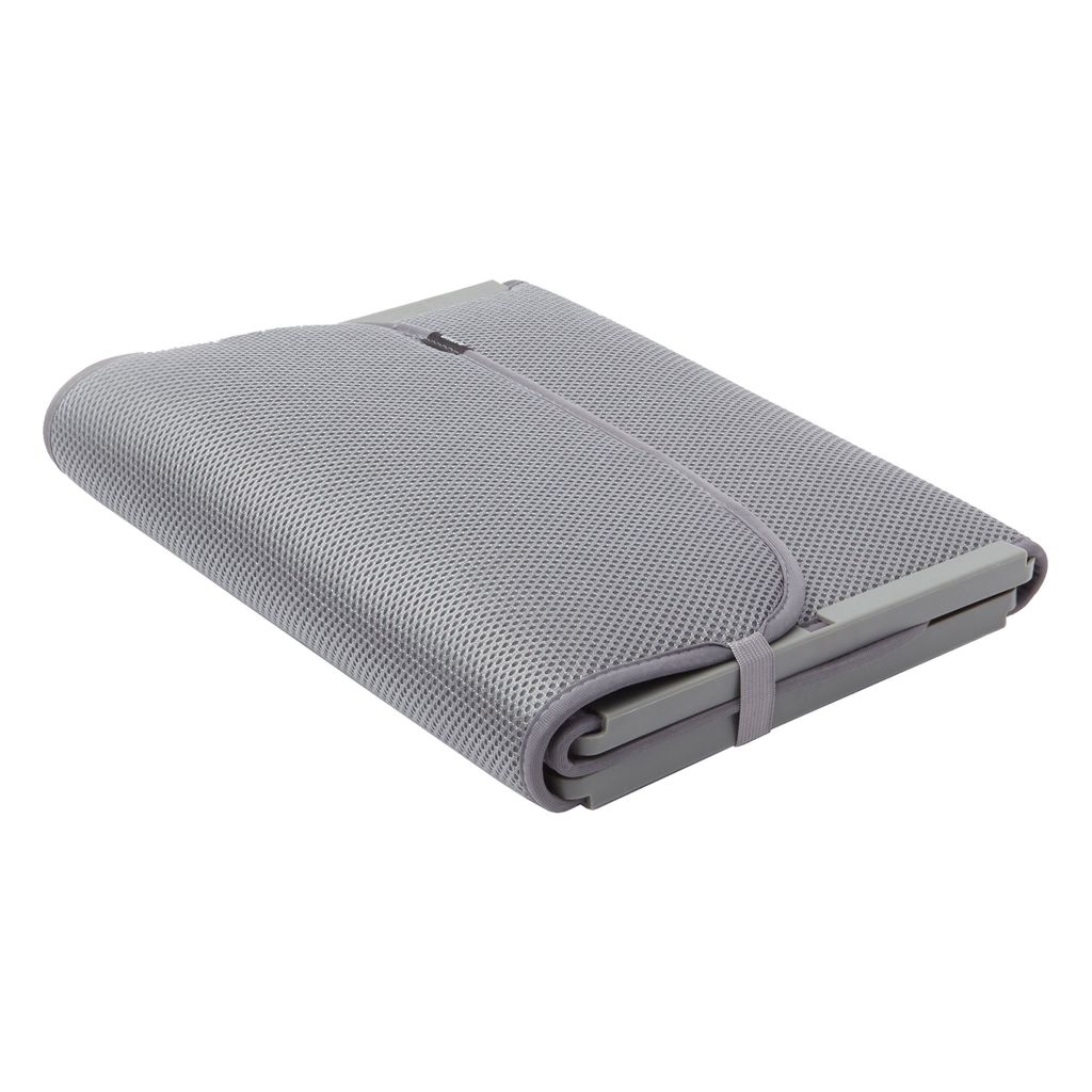 A folded gray shoe mat on a white background.