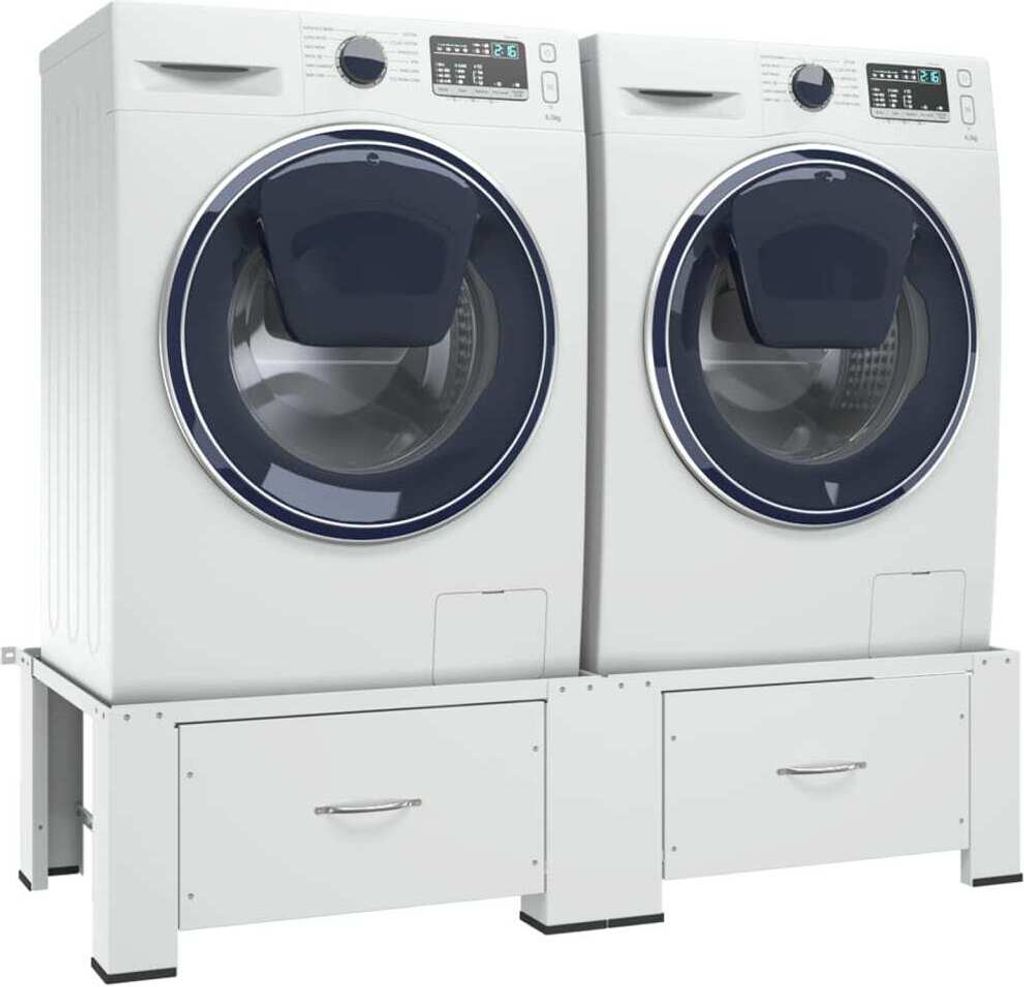 Two white washing machines are stacked on white drawers, shown from the front.