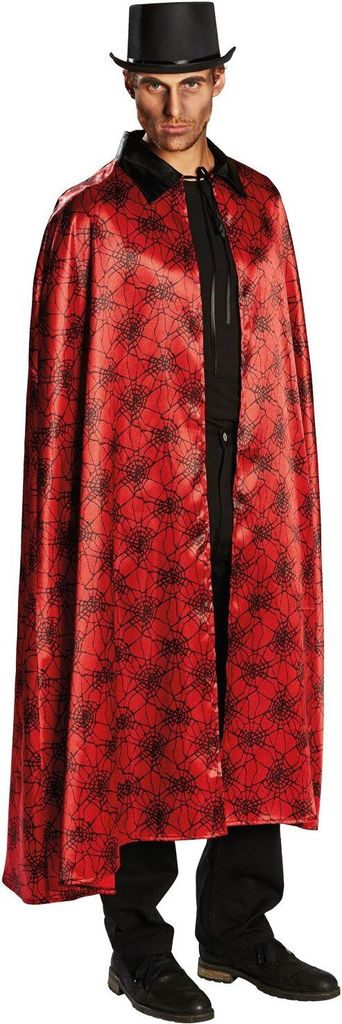 A man wearing a costume, including a cape and a top hat.
