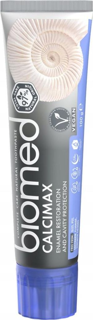 A tube of BIOMED CALCIMAX toothpaste.