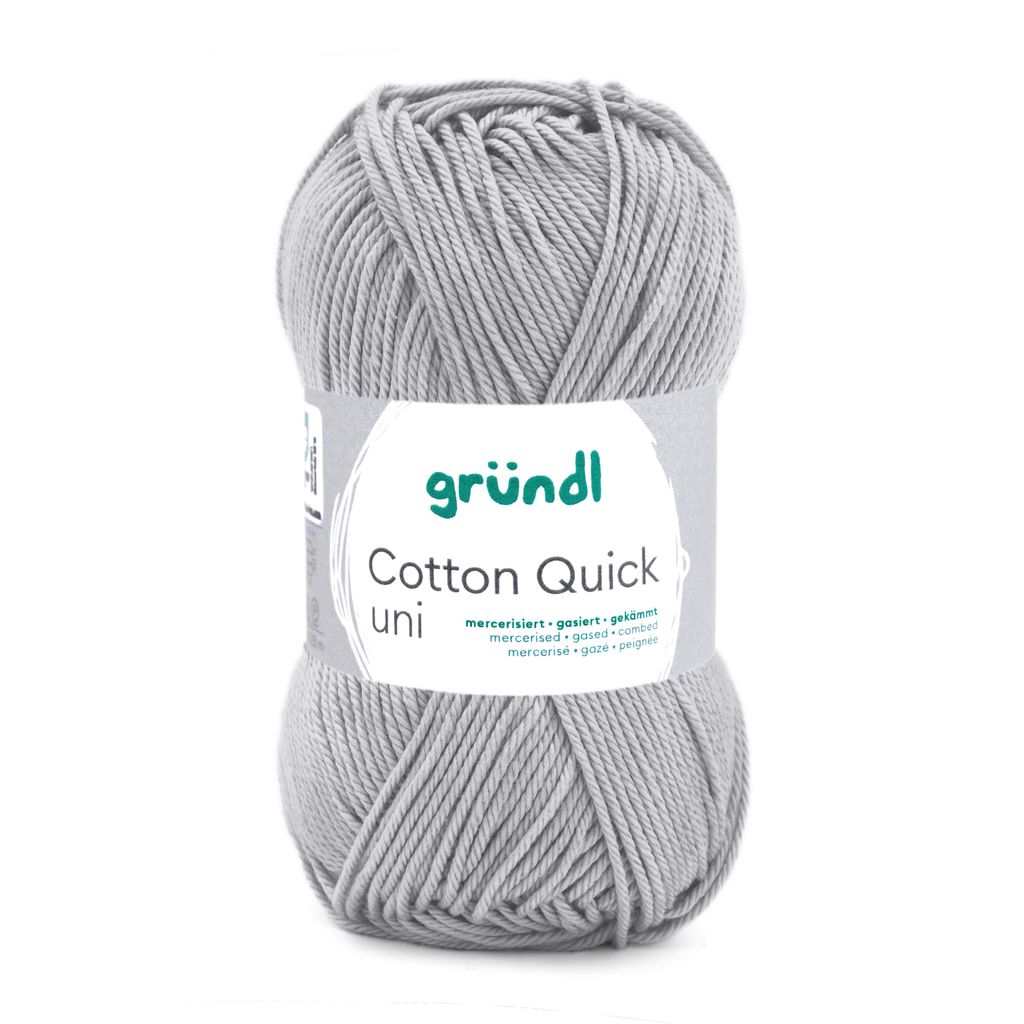 A ball of grey yarn with a label.
