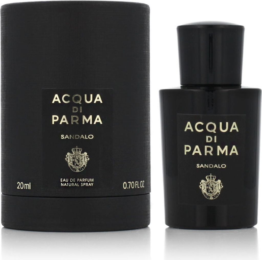 A black perfume bottle and its packaging are shown against a white background.
