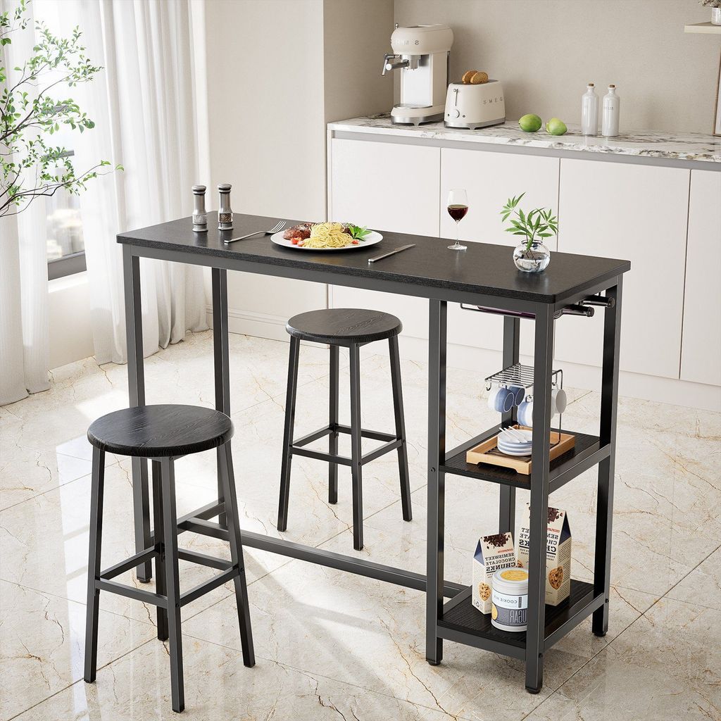 A black bar table with two stools and shelves, set in a kitchen or dining area.