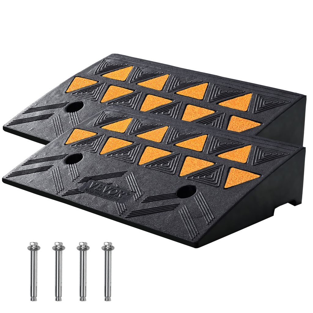 Two black rubber ramps with orange triangular textured inserts, shown diagonally with four metal bolts in the foreground.
