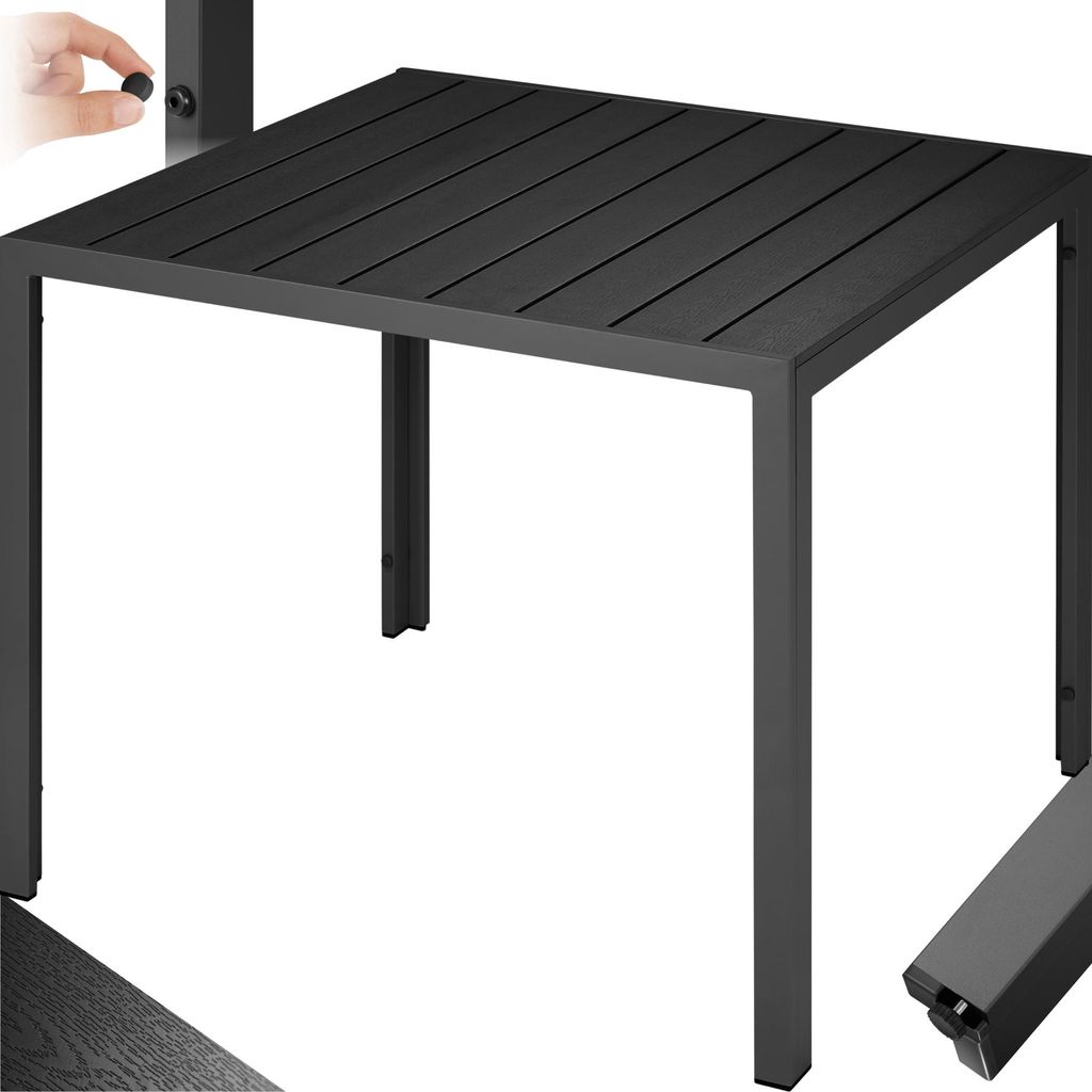 A close-up view of a black aluminum garden table.
