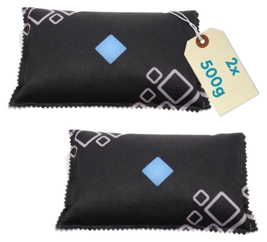 Two black dehumidifier bags with a geometric pattern and a blue diamond in the center, placed on a white background. A tan tag with text is attached to the top bag.