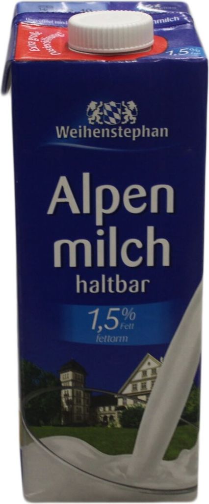 A carton of milk with a scenic background.