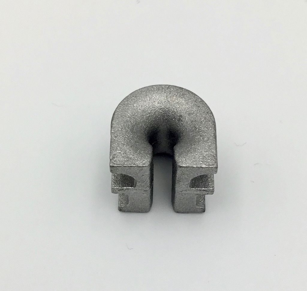 A single metal part on a white background.