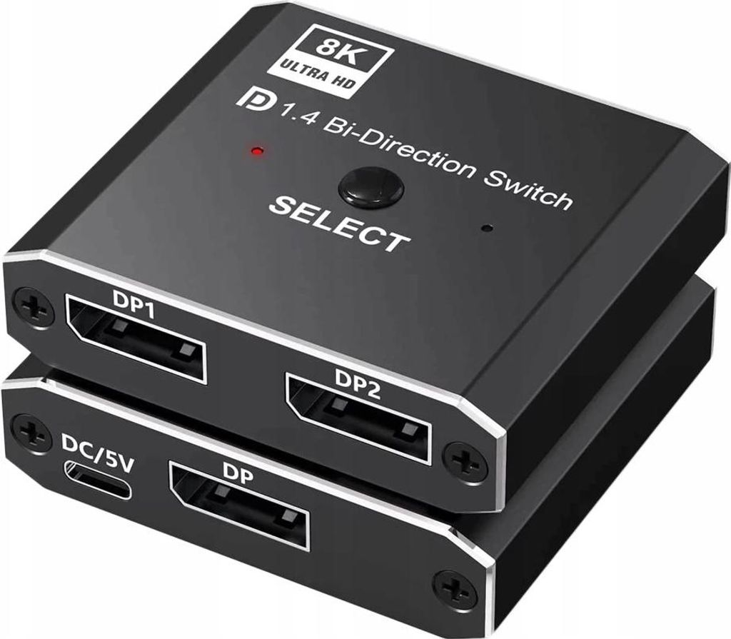 A close-up, slightly angled view of a black DisplayPort bi-directional switch with ports labeled DP1, DP2, and DC/5V.