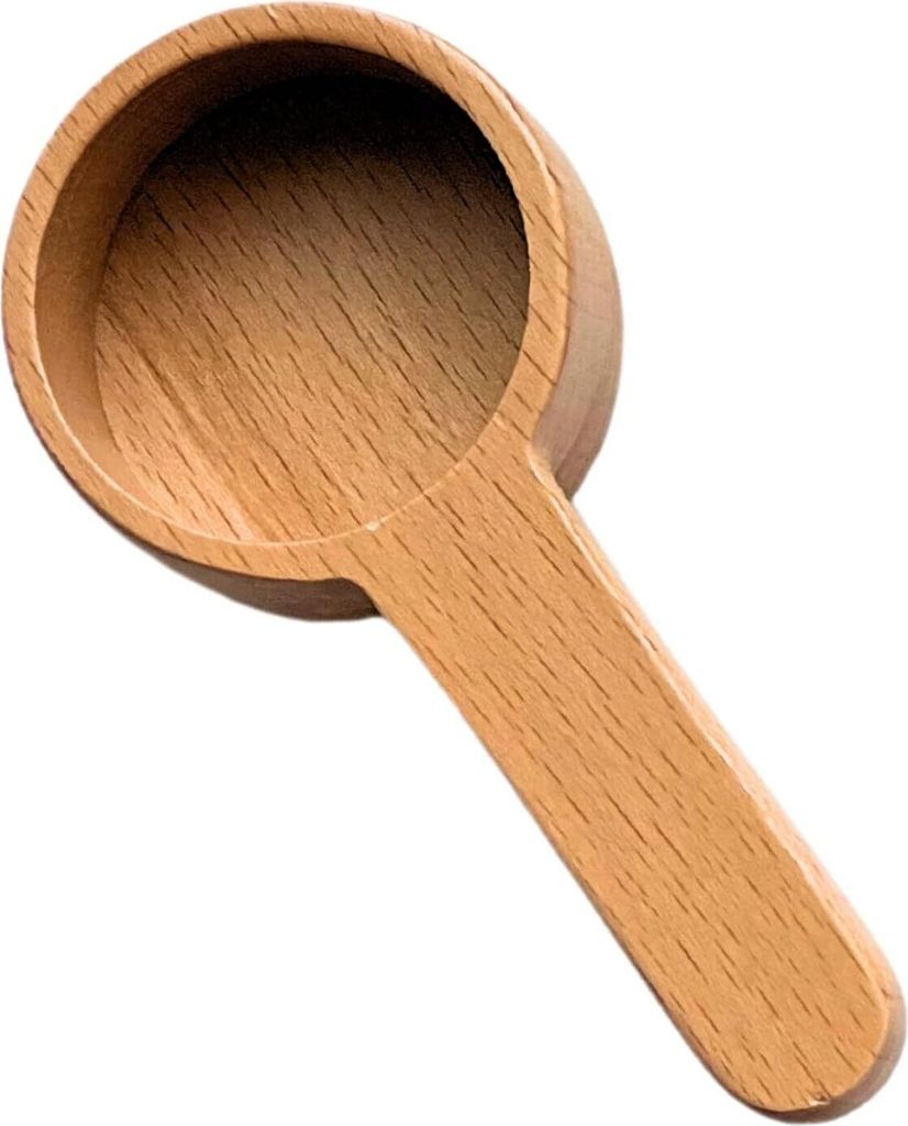 A wooden coffee scoop is shown against a white background.