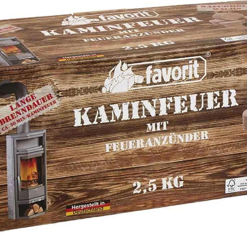 A close-up of a cardboard box for fireplace logs, with an illustration of a fireplace and text in German.