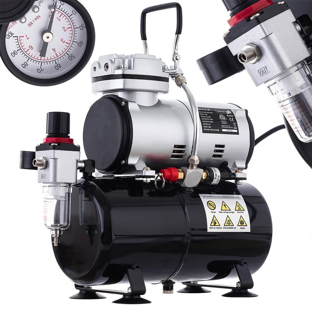 A close-up studio shot of an airbrush compressor.