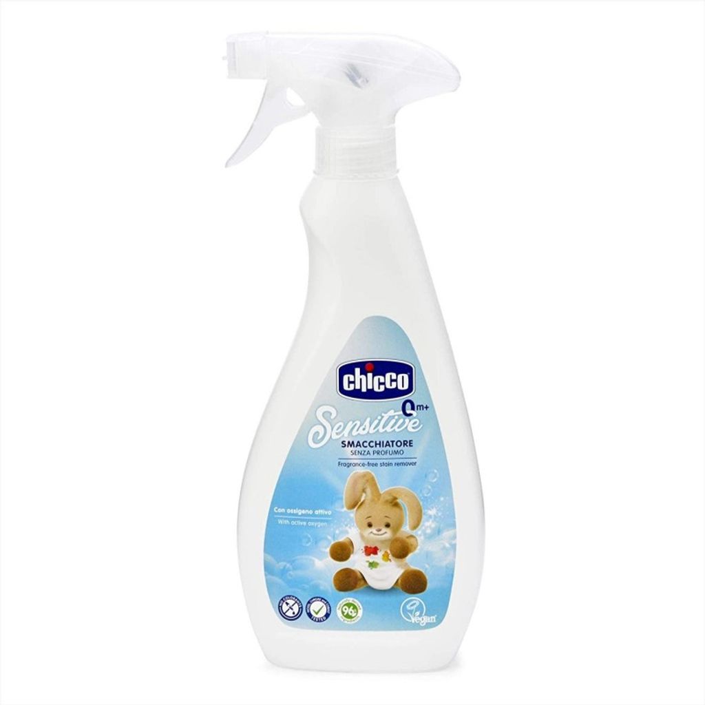 A white spray bottle of Chicco Sensitive Smacchiatore stain remover for babies, with a blue label featuring a cartoon bunny.