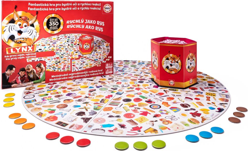 A board game called LYNX is laid out on a white surface, with its box and components visible.