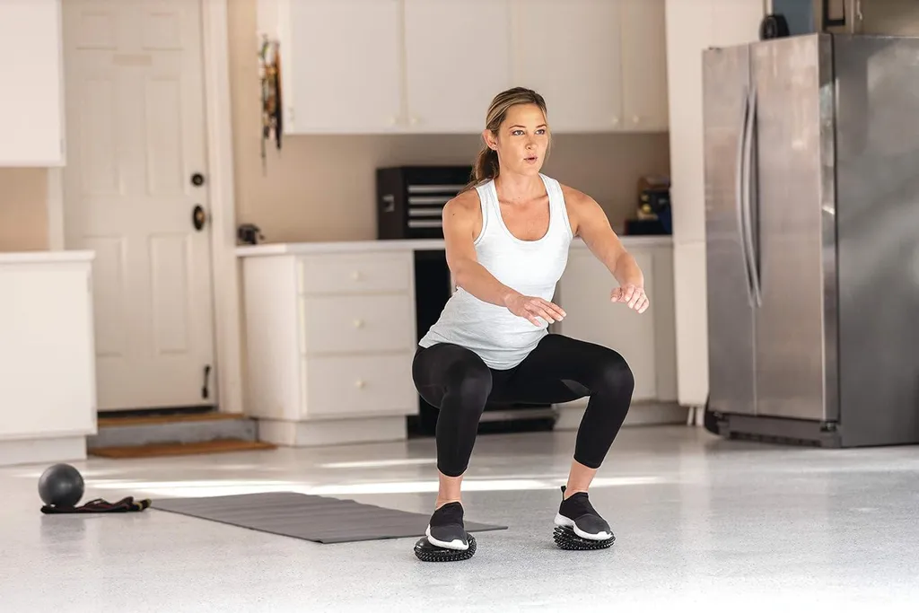 Coussin d'équilibre fitness noir pour entraînement de proprioception