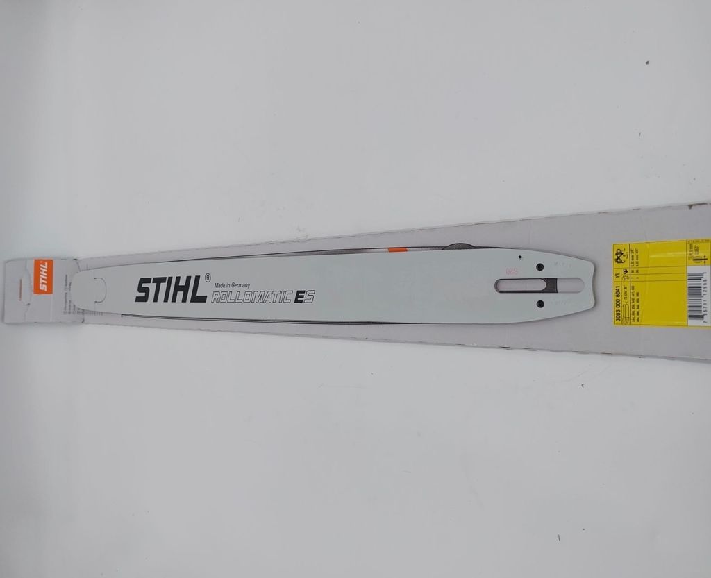 A STIHL chainsaw guide bar in its packaging, presented on a white background.