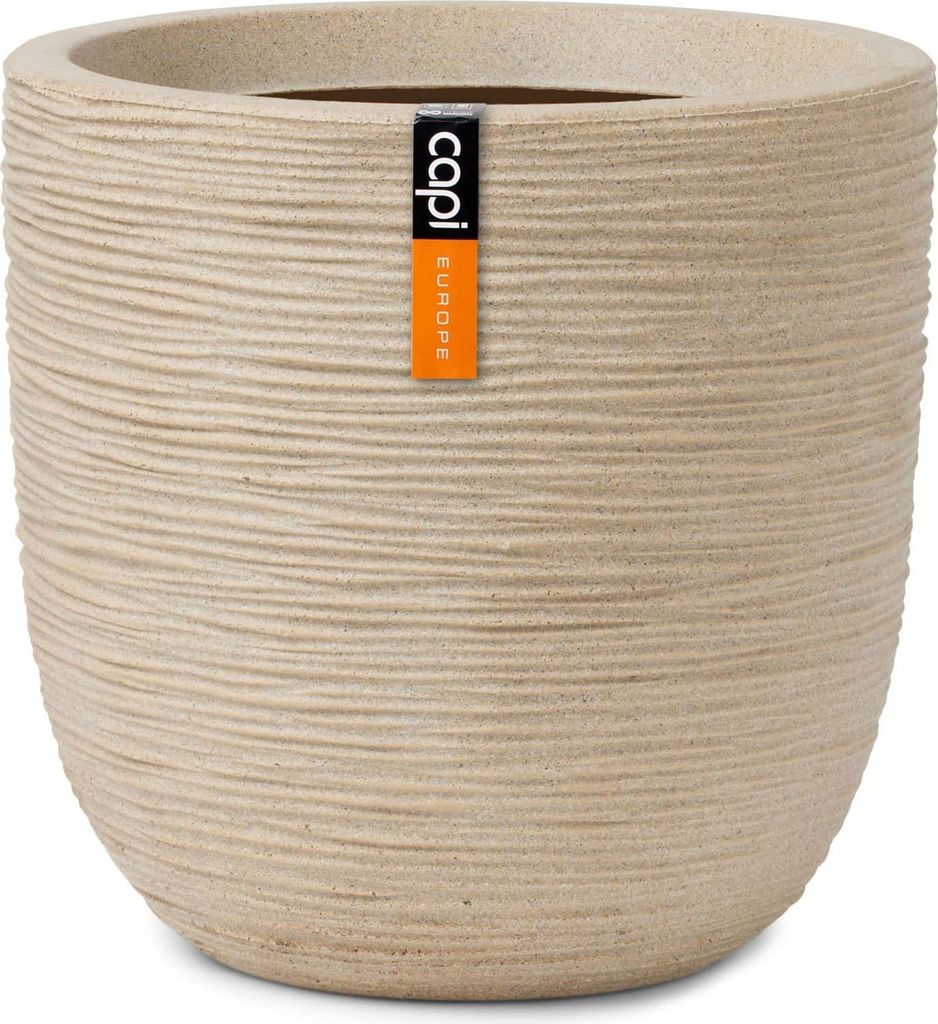 A beige planter pot with a textured surface and a brand label.