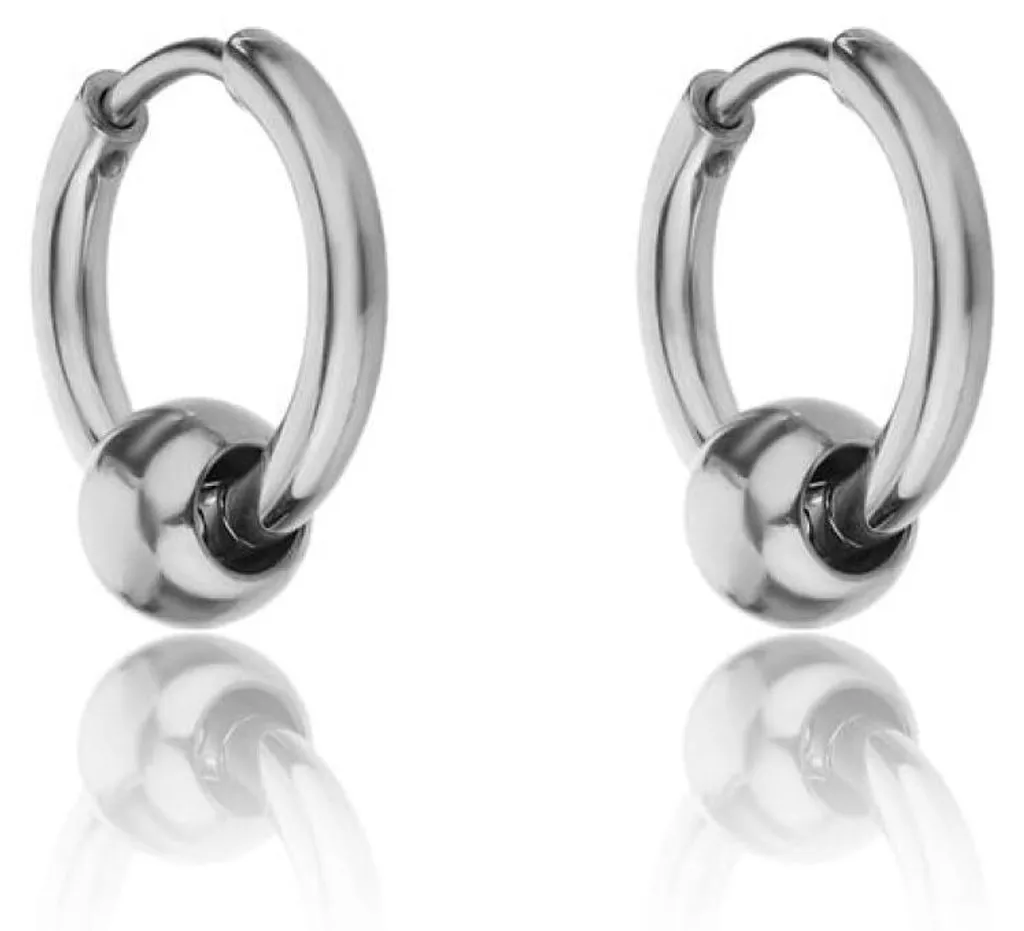 Boucles d'oreilles créoles argentées en acier pour femme - Style Pur