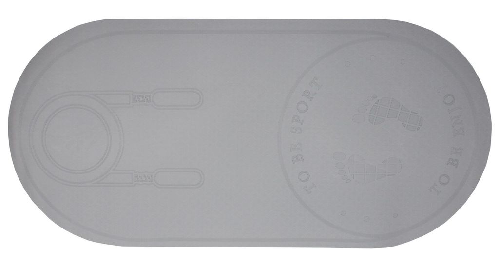 A gray mat with embossed markings.